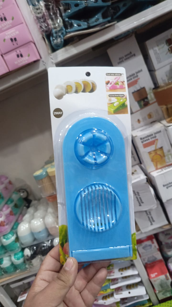 2-in-1 Egg Cutter & Slicer 2-in-1 Egg Cutter & Slicer 2-in-1 Egg Cutter & Slicer